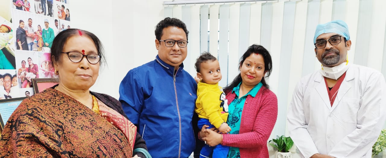 Happy parents with Dr. Prasenjit Kr. Roy celebrates the joy of their life.
